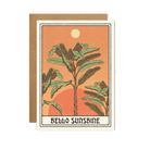 "Hello Sunshine" Card showcasing a sunny, vibrant design on a pastel yellow background, placed on a light wooden surface.