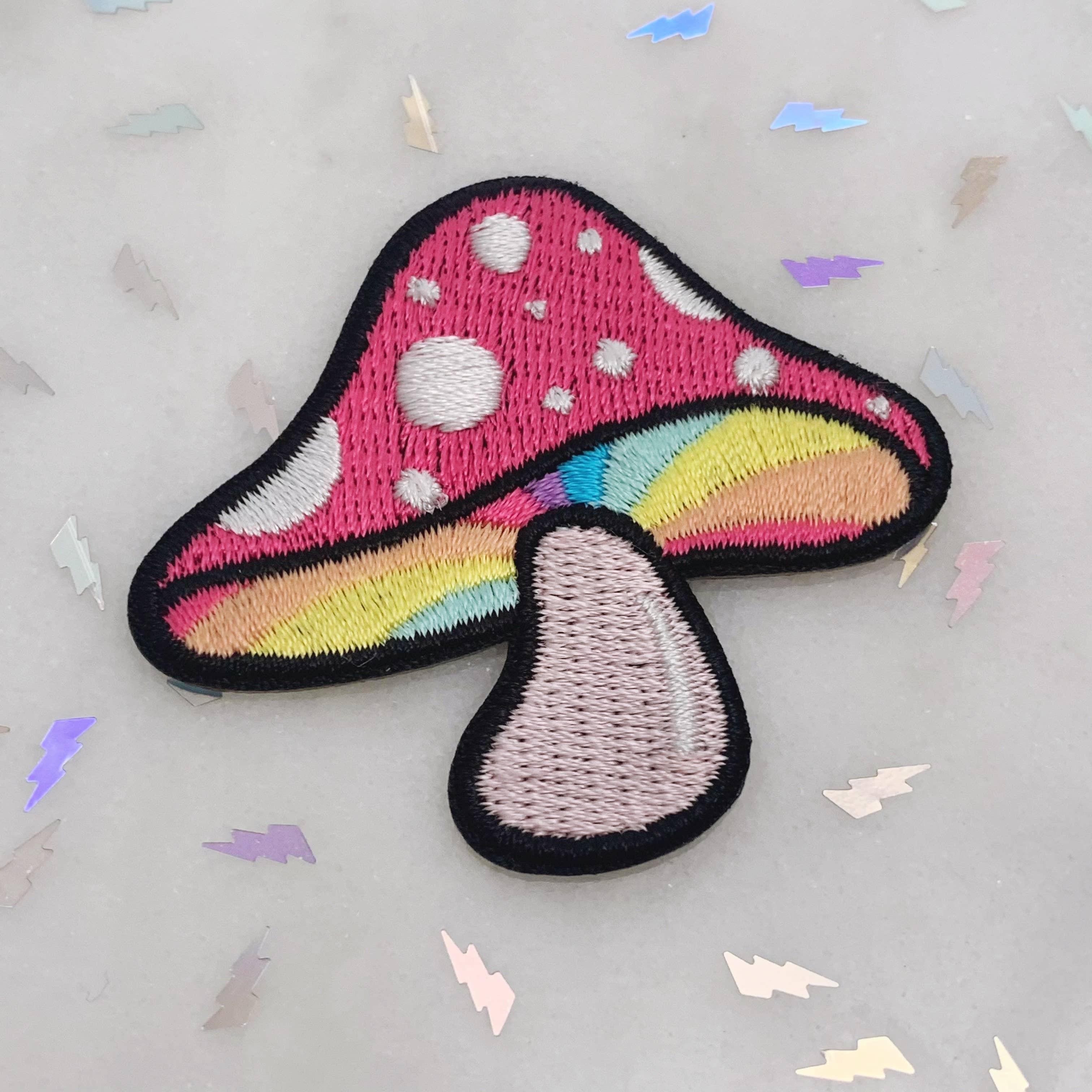Detailed embroidery patch of a classic woodland mushroom.