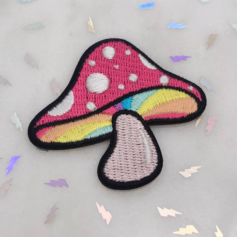 Detailed embroidery patch of a classic woodland mushroom.