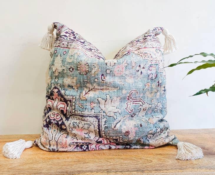 Image of the 'Handmade Printed Persian Cotton Cushion Cover', featuring its soft and fluffy texture, the handmade tassels at each corner, and the intricate printed design.