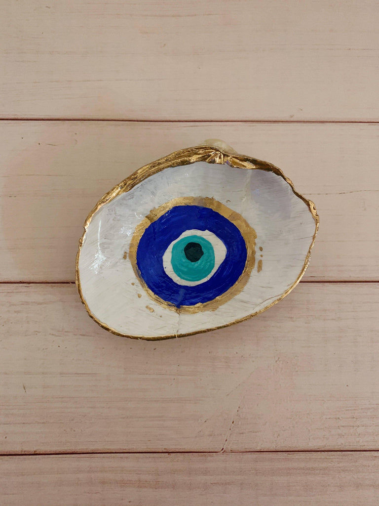 Evil Eye Shells displaying the iconic blue and white design, symbolizing protection and warding off negative energies.