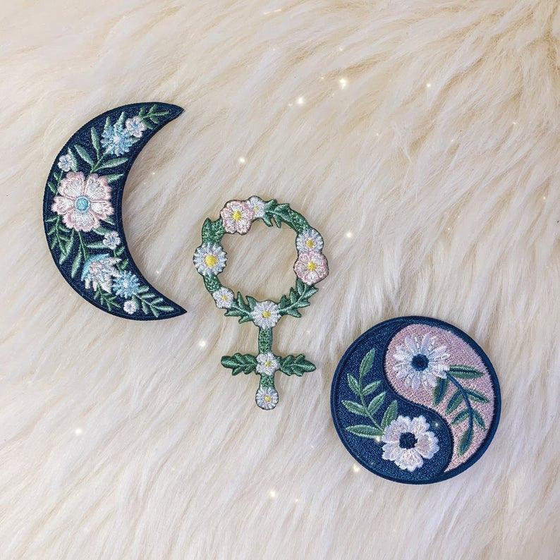Botanical Yin Yang Patch, displaying the elegant fusion of yin and yang symbol with intricate botanical designs.