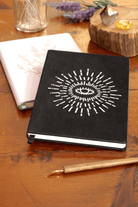 Awakening Embroidered Journal - A beautifully crafted journal with intricate embroidery on the cover, perfect for capturing creativity.