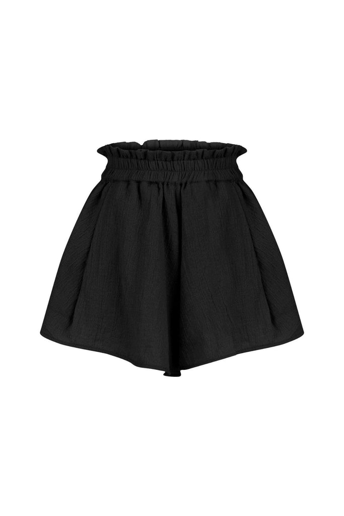 Piper Shorts displayed against a neutral background, showcasing their stylish mini length design.