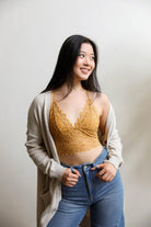 Forma's Daisy Lace Bralette, featuring a charming daisy lace design for a touch of whimsy and comfort.