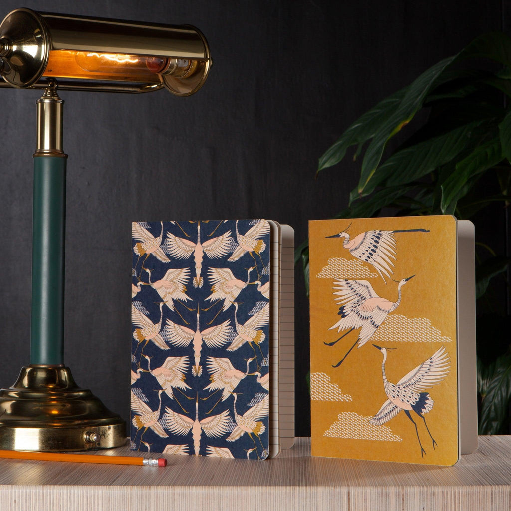 Golden Crane Notebook - Soft-bound notebook featuring a graceful avian design.