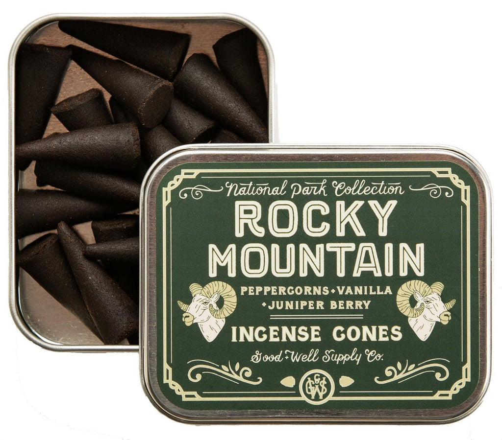 Rocky Mountain Incense sticks against the majestic Rocky Mountains, reflecting the product's fresh, enduring fragrance.