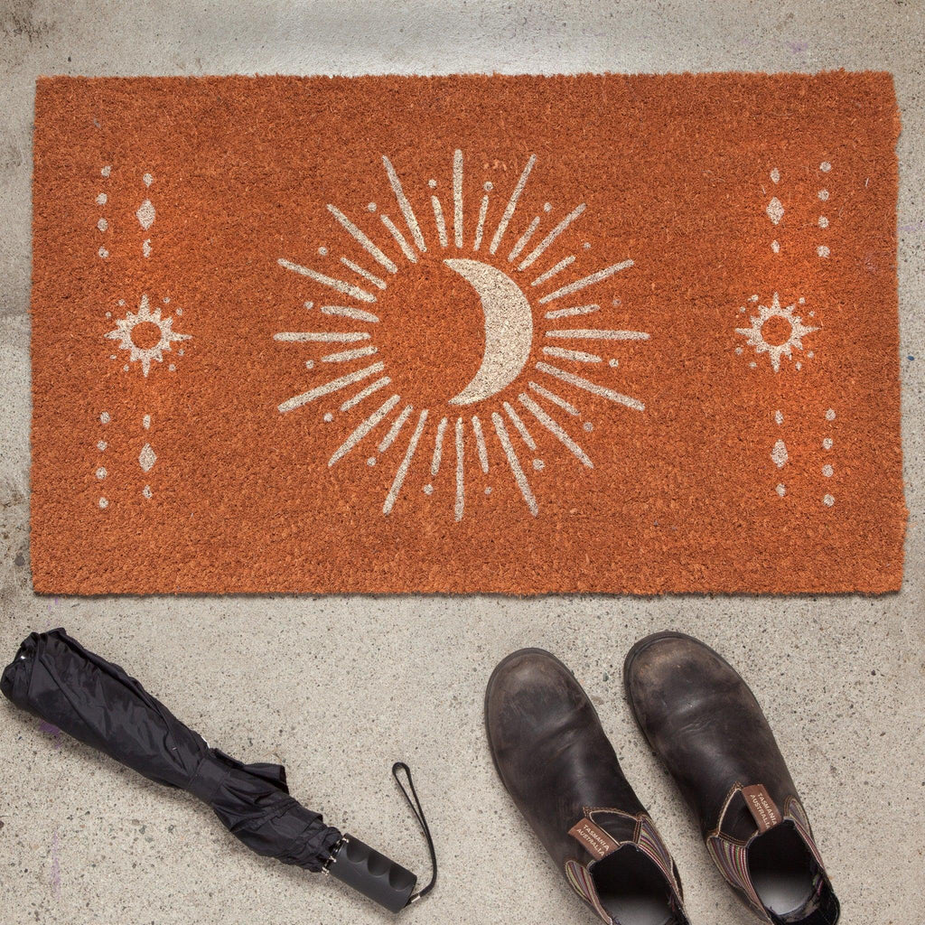 Sun + Moon Coir Fiber Doormat - Biodegradable doormat with radiant sun and moon design, ideal for outdoor entryways.