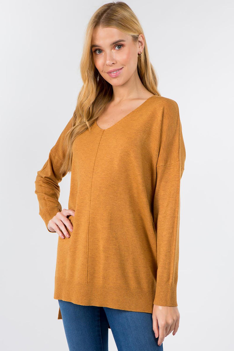 Sydney Hooded Sweater showcasing its comfortable fabric blend and trendy hooded design, perfect for a cozy and stylish look.